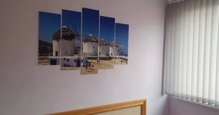 Kundfoto av en femdelad väggtavla i hemmet — Marina